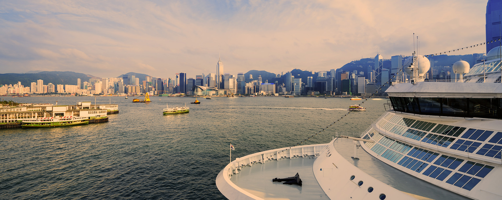 Cruise ship overlooking Hong Kong harbour at sunset